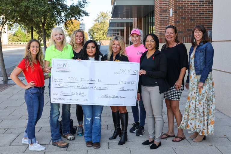 National Association of Women in Construction presents Maria Torres, CFCC construction management student inaugural scholarship.