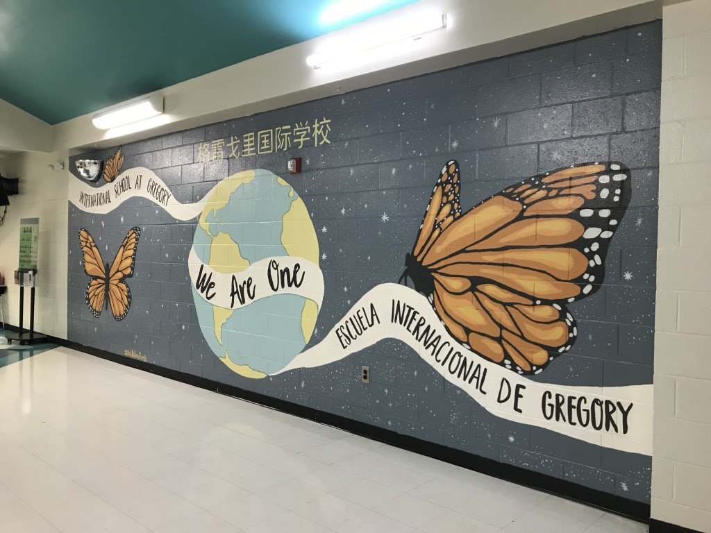 Painting I Students Bring "We Are One" Mural to the International