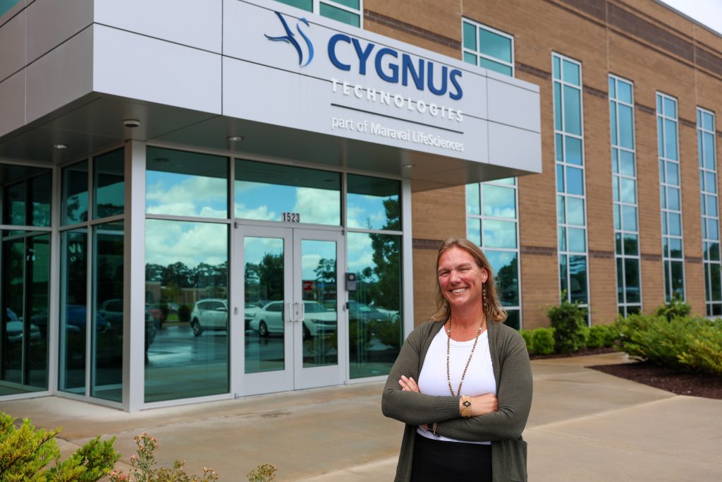 Erin Watson standing in front of lab building