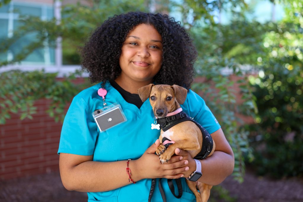 isabel and her dog outside