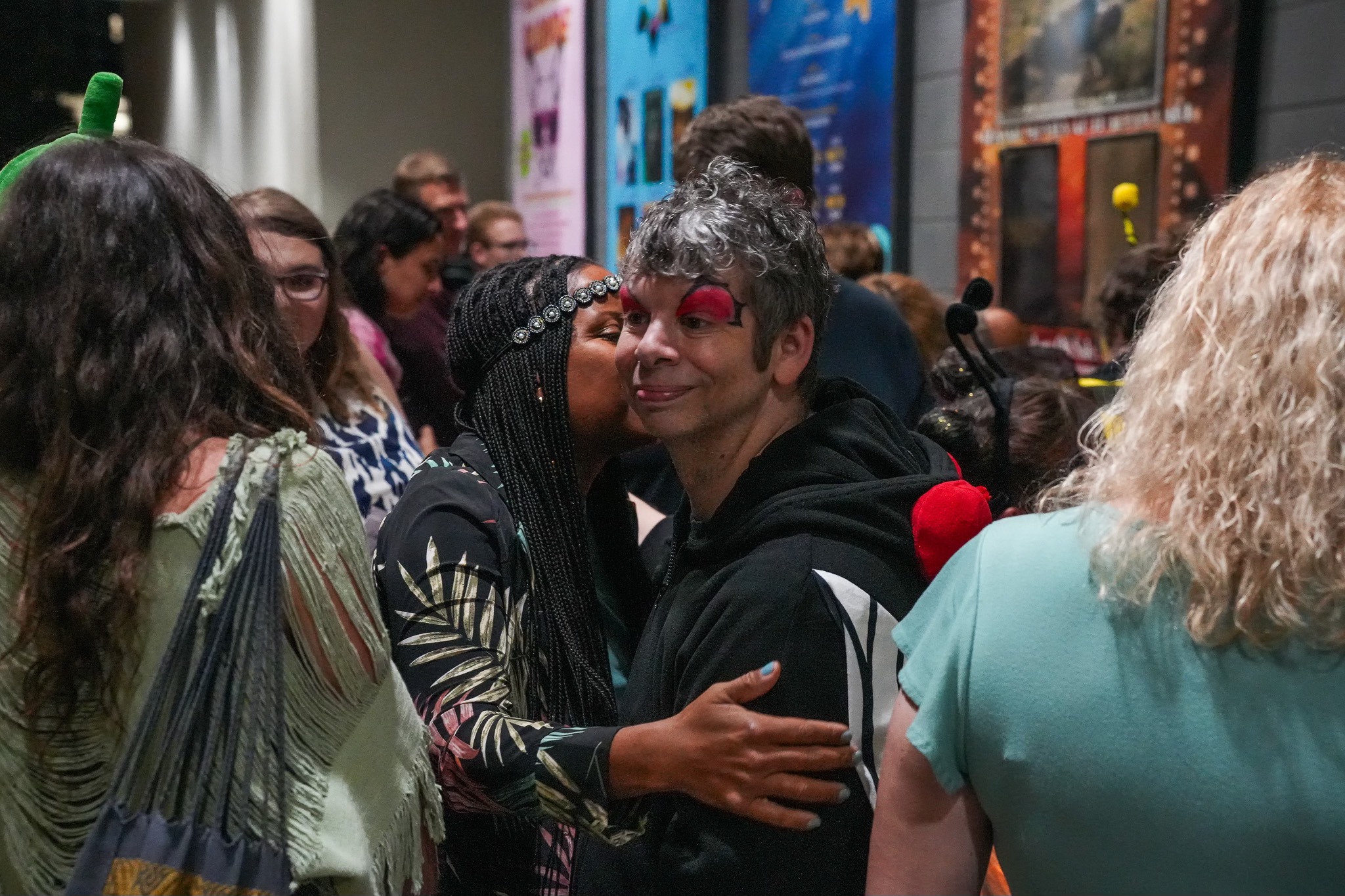male embracing a female after a performance