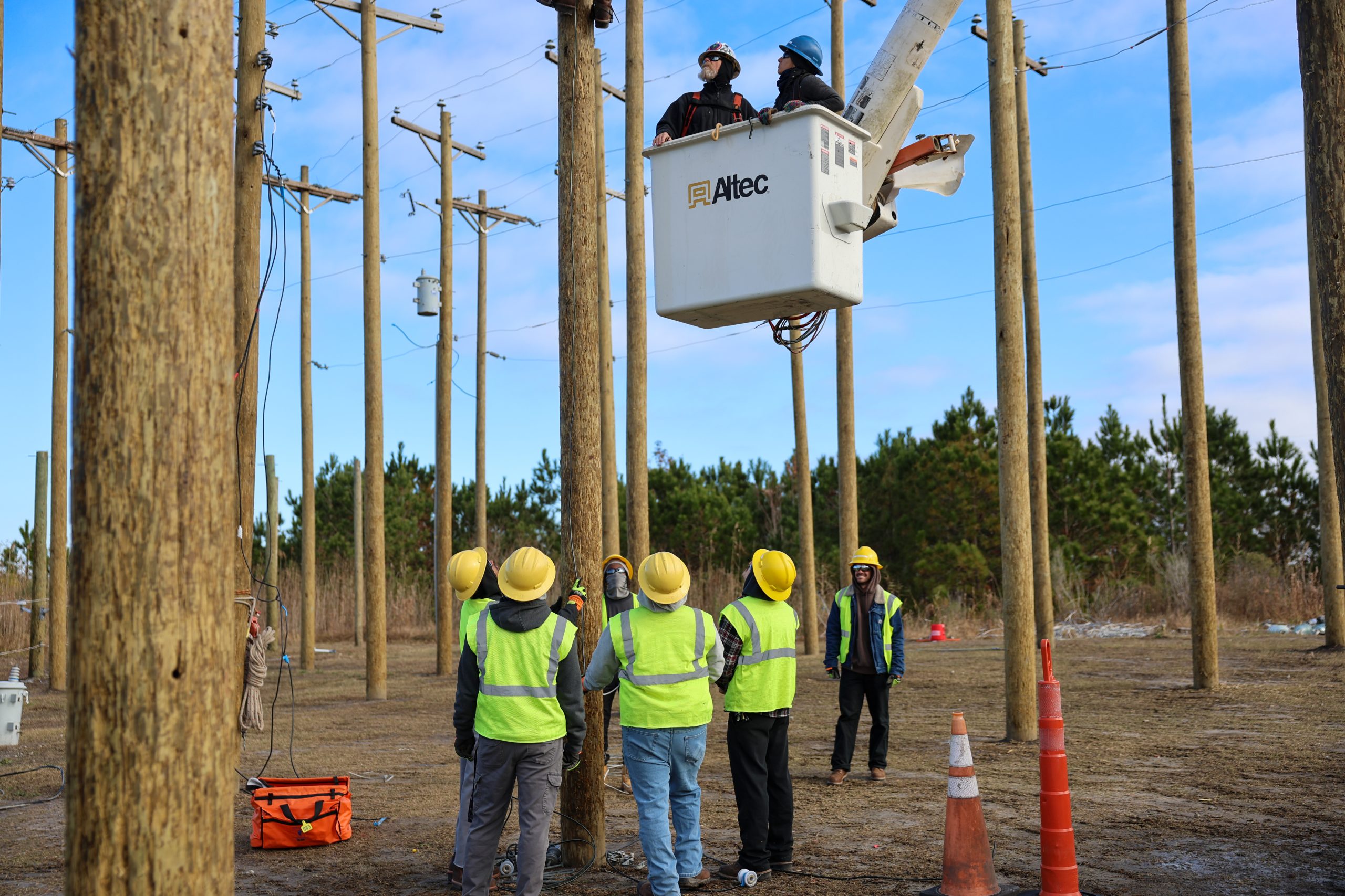 electrical lineworker students at poleyard