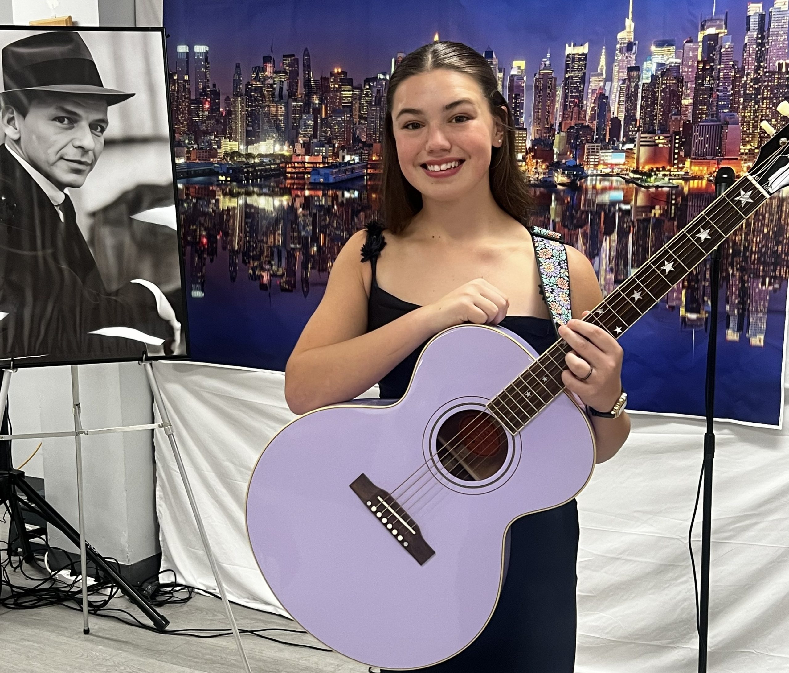 diana holding guitar