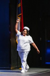 graduate walking across stage