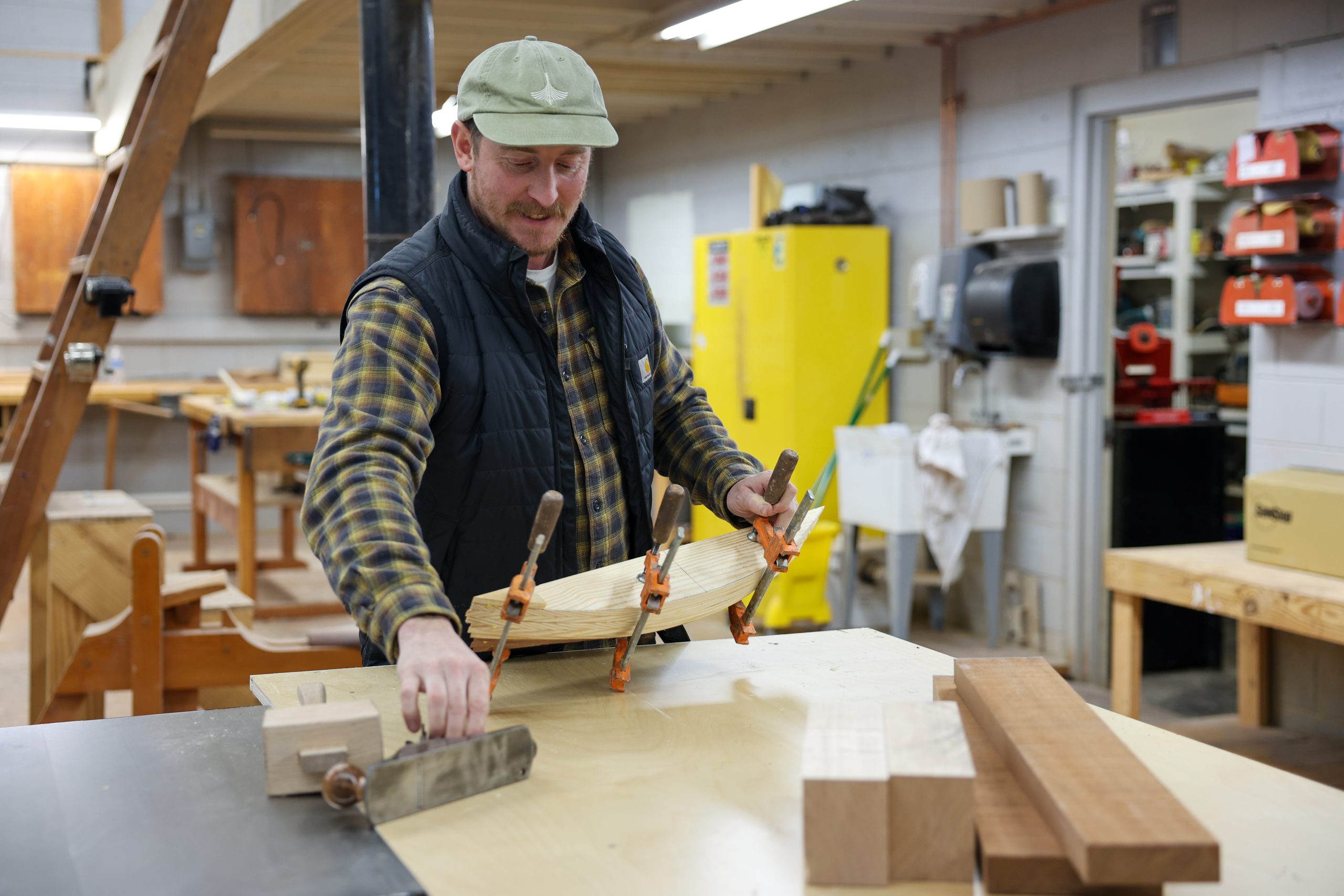 male working in boat shop