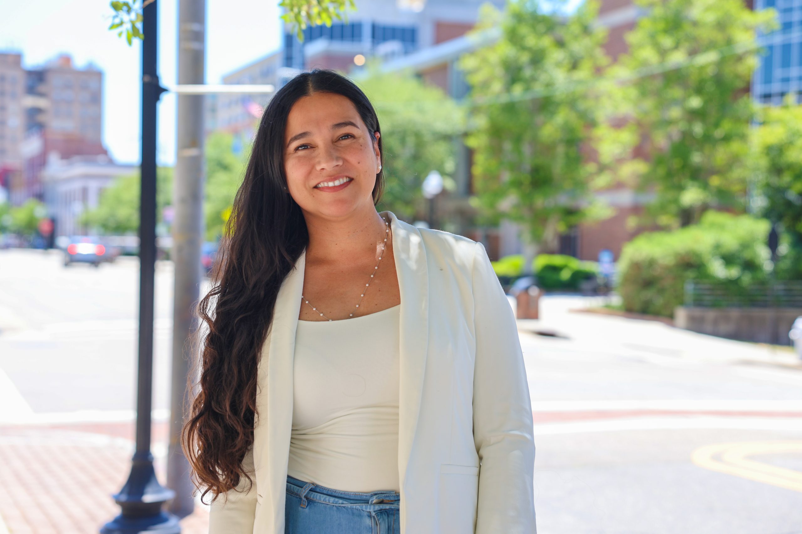 headshot of student outside of campus