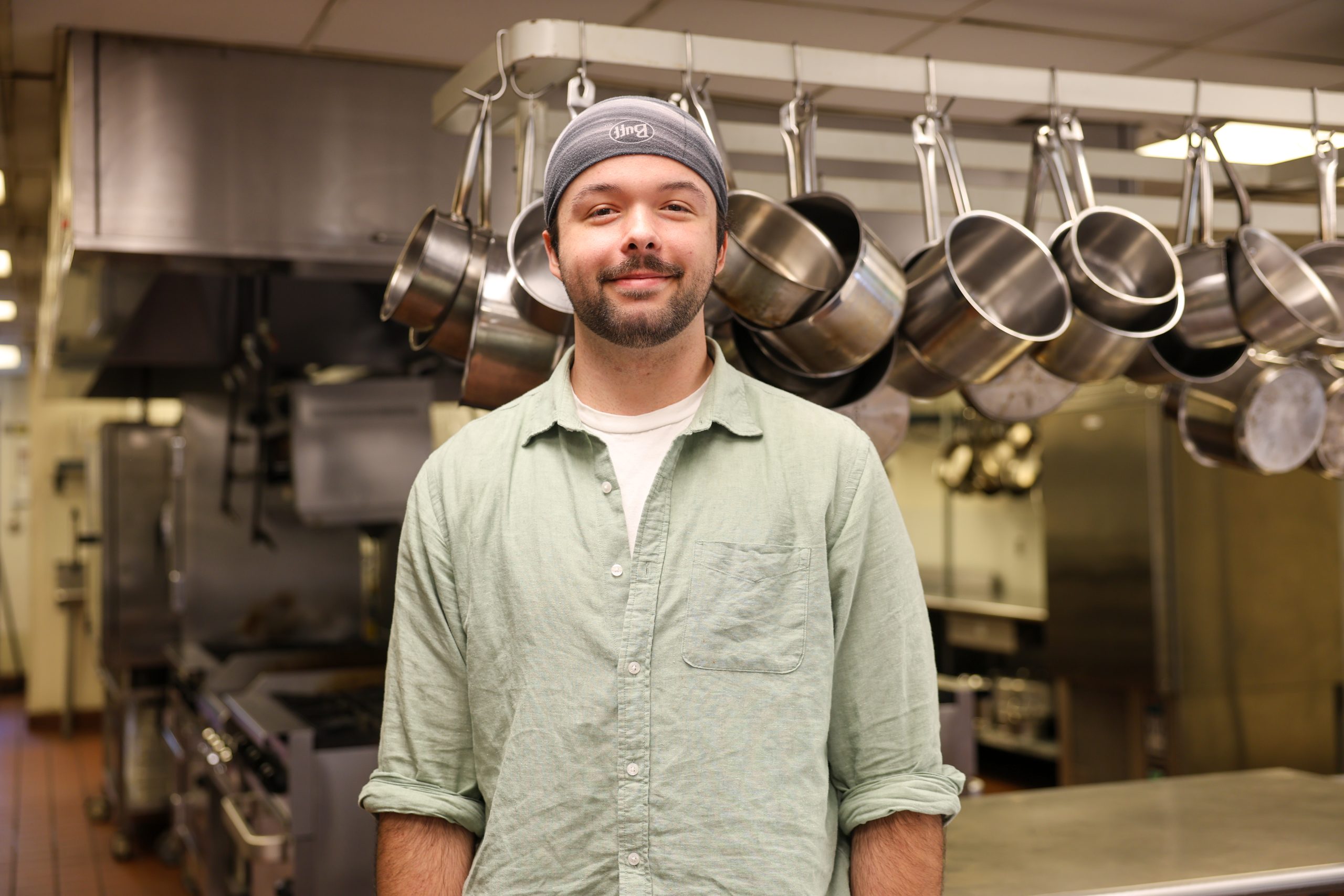 culinary student posing in kitchen