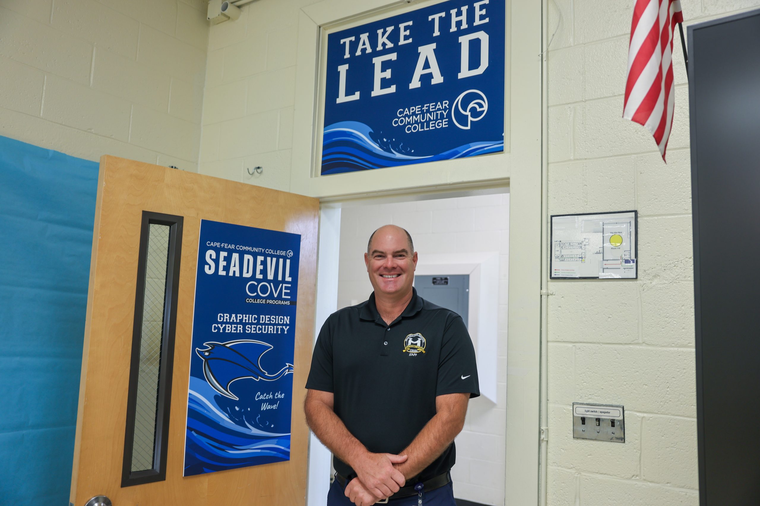 principal standing in doorway of new CFCC classroom